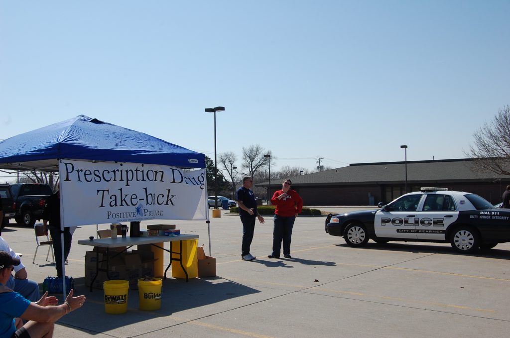 Volunteers collect unwanted medication at the Prescription Take-Back in Good Samaritan Hospital’s parking lot.