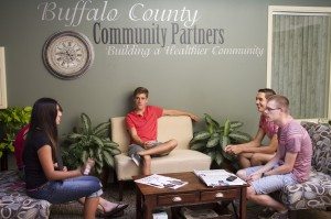 One of the breakout groups at the YAB meeting discusses potential community service projects.