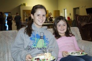 YAB member Holly Dethlefs spends time with her “little friend” at a mentoring event.