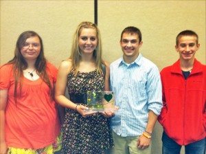 Victoria Harmony (Amherst), Isabel Thalken (Kearney), and Lance English (SEM) accepting the CHI Building a Healthy Community Youth Award.