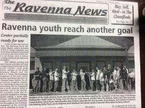 Members of Youth Advisory Board cut the ribbon signaling the completion of the first stage of the Bluefay Headquarters Youth Center on Friday. --Ravenna News September 2004